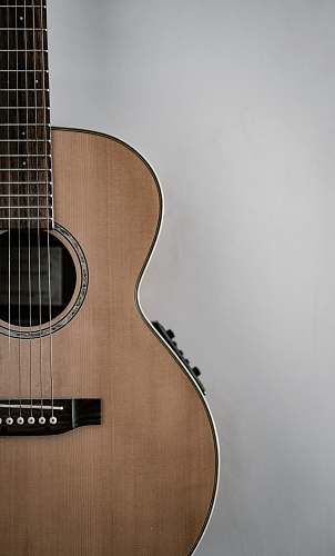 leisure activities brown guitar musical instrument